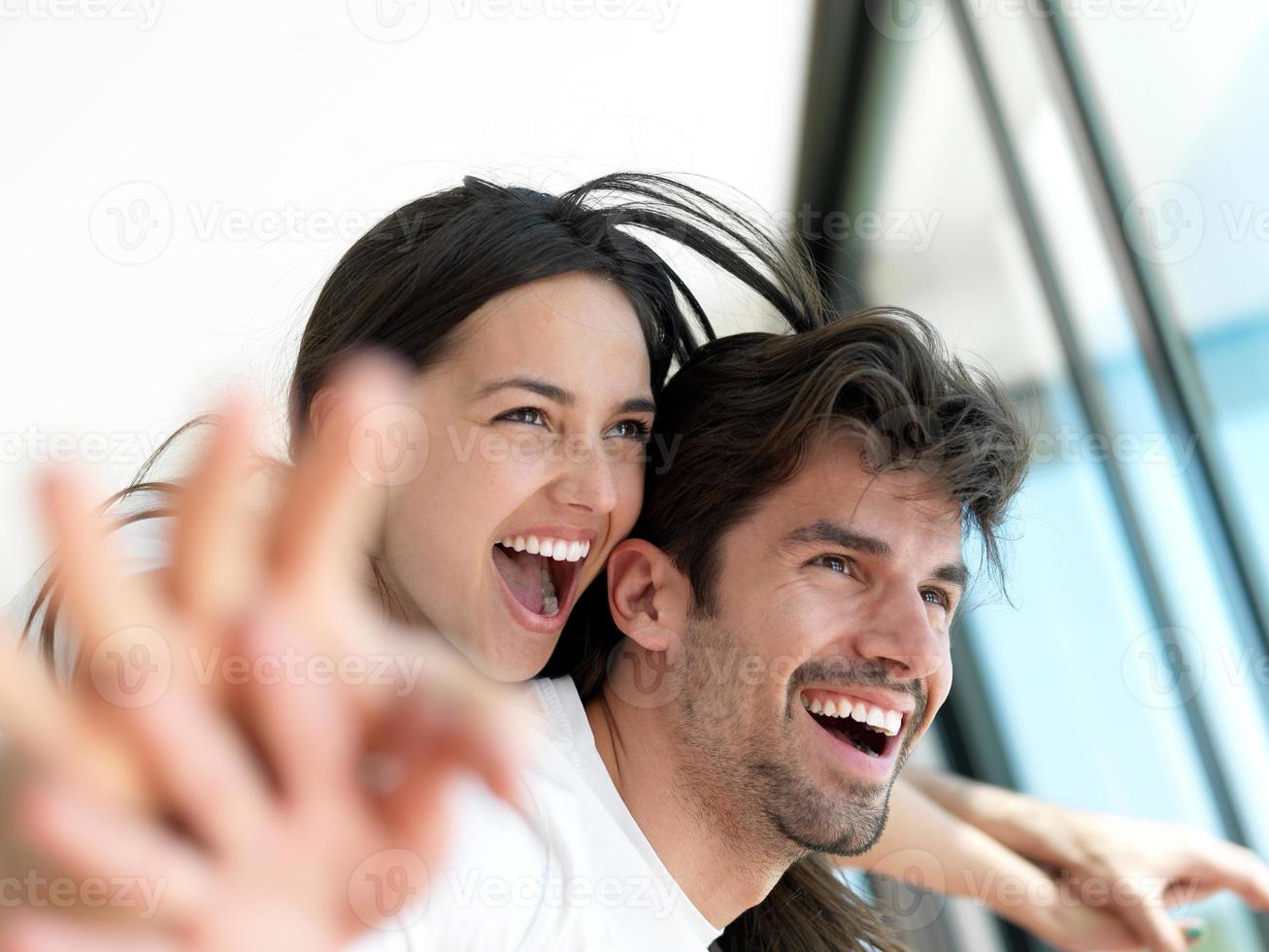 relaxed young couple at home photo