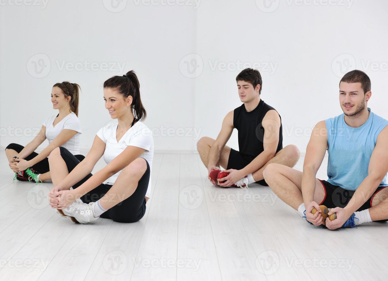 young people group in fitness club photo