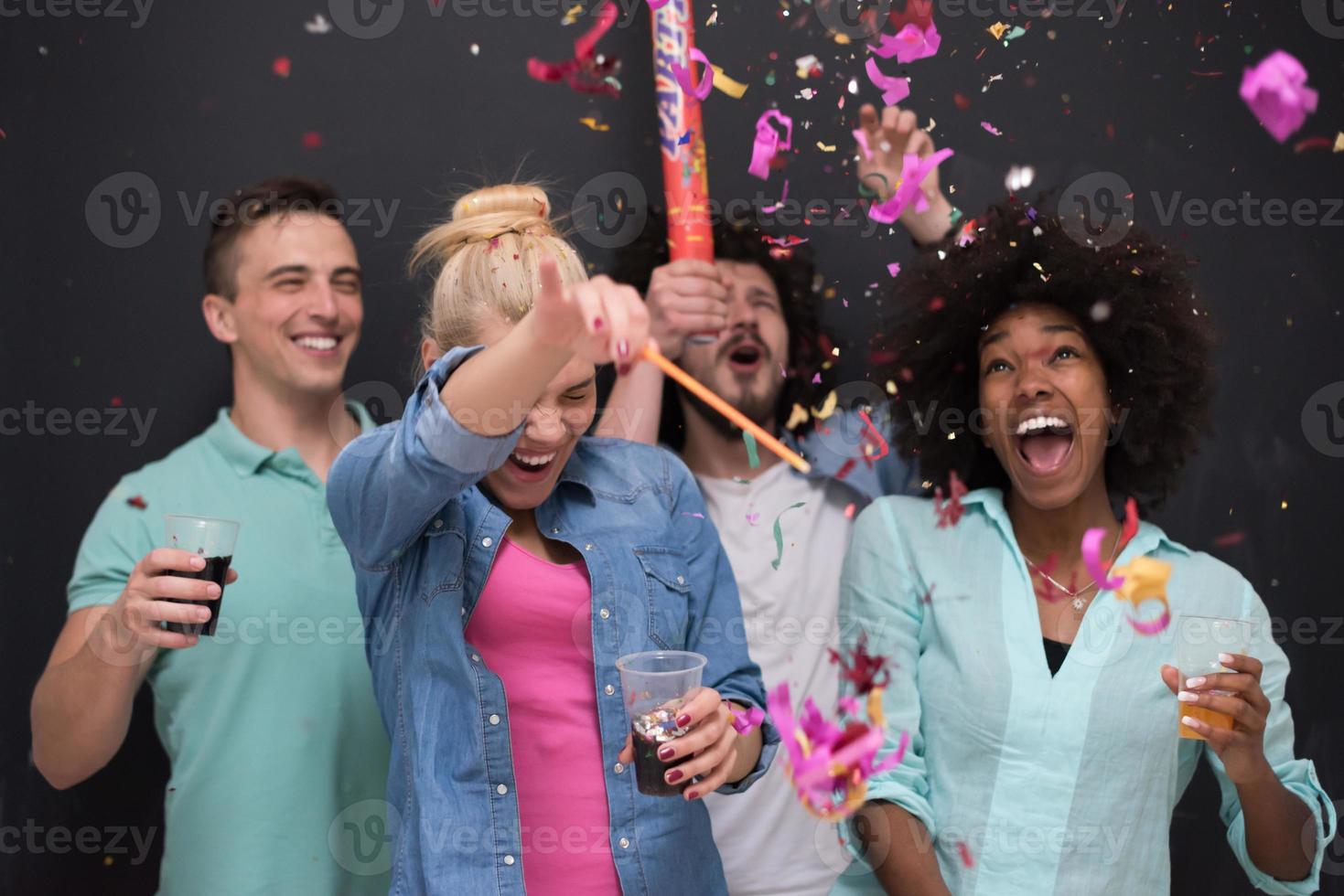 confetti party multiethnic group of people photo