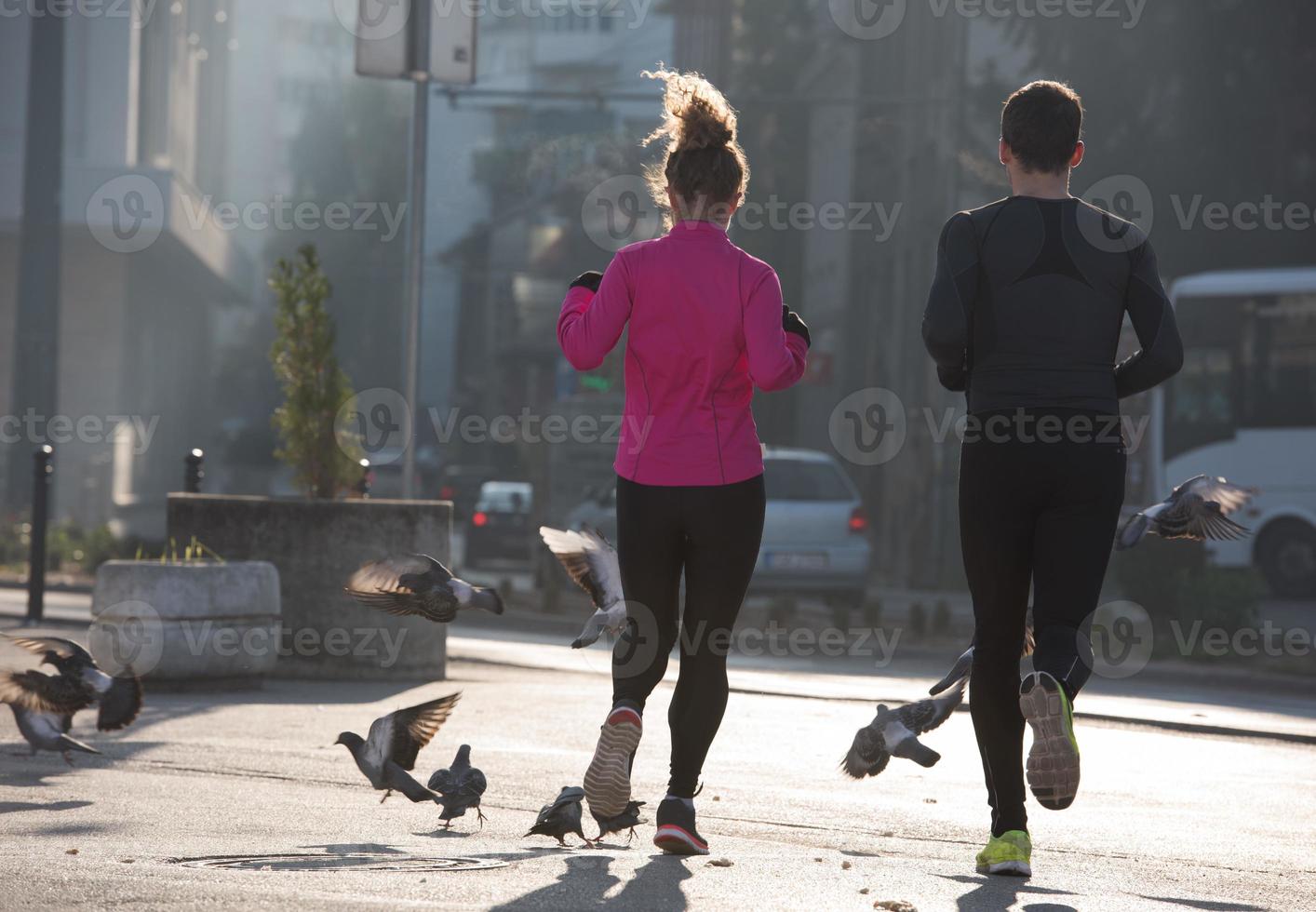 young  couple jogging photo