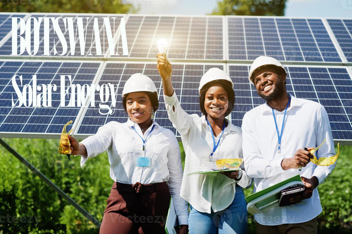 Botswana solar energy. African engineers at panels station. photo