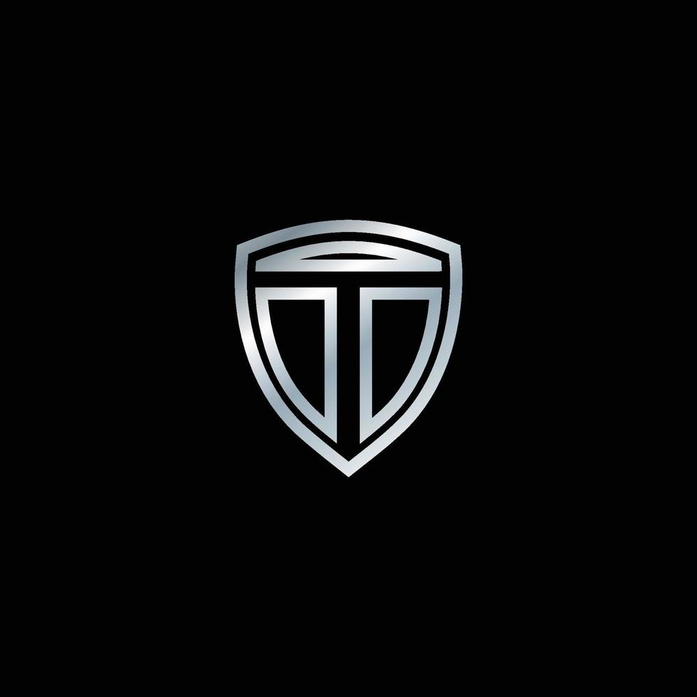 The logo of the letter T emblem. The design is accompanied by a silver shield. Letter shield logo design concept template vector