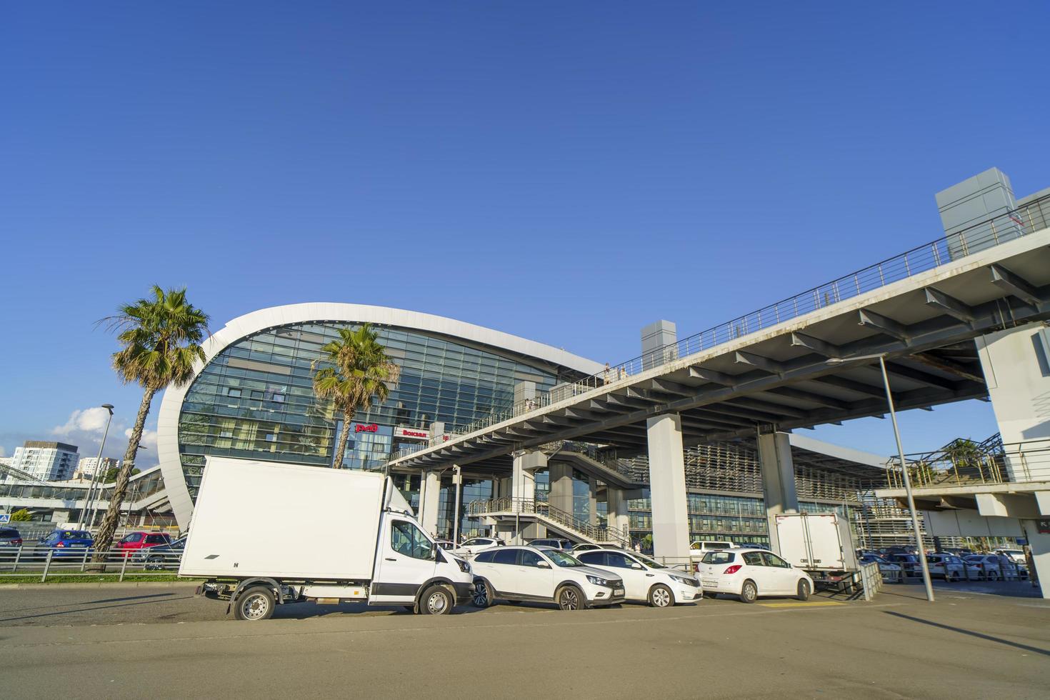 Sochi, Russia - July 28, 2022  Urban landscape with Adler railway station photo