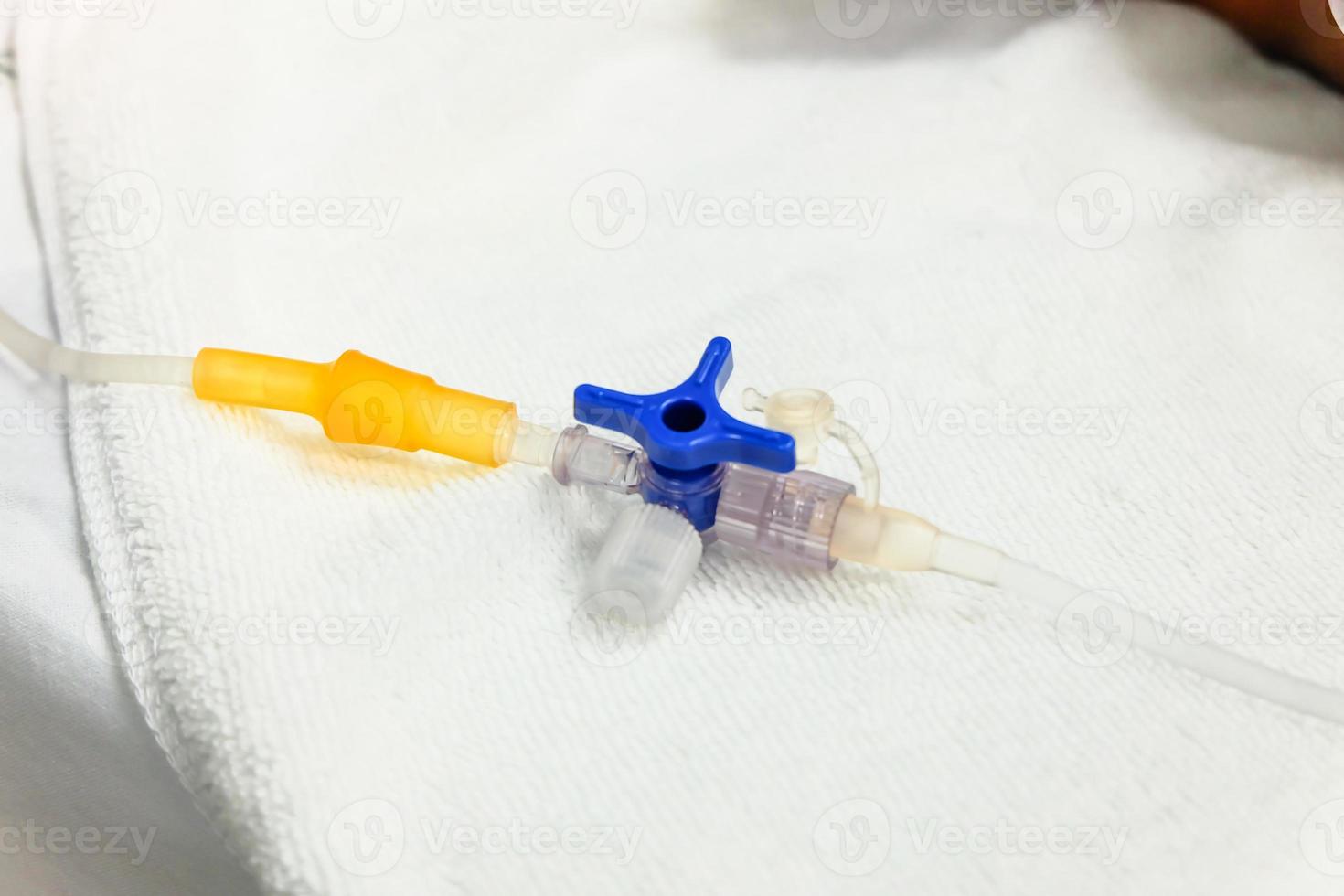 Saline solution tubes and joints connection for medication drip therapy photo