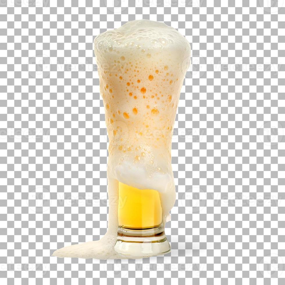 Isolated cold beer on glass with foam photo
