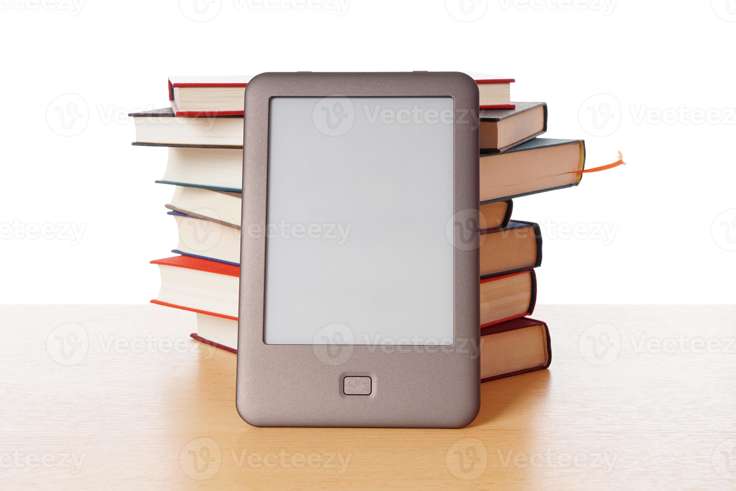 ebook reader vs pile of books 11019648 Stock Photo at Vecteezy