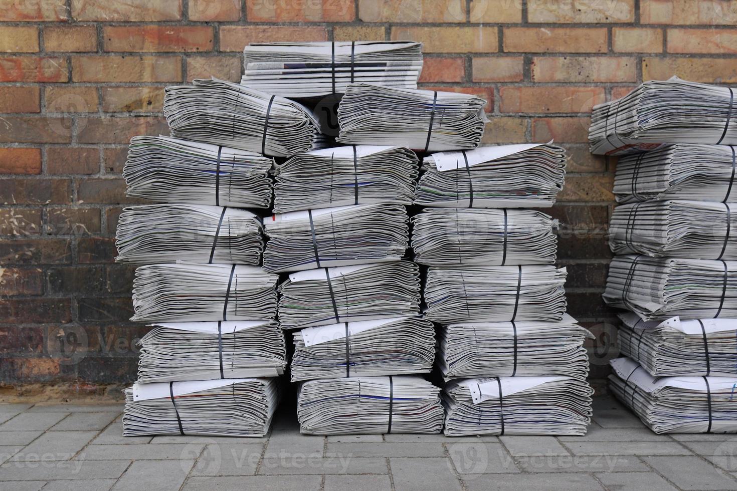 newspaper stack on street photo