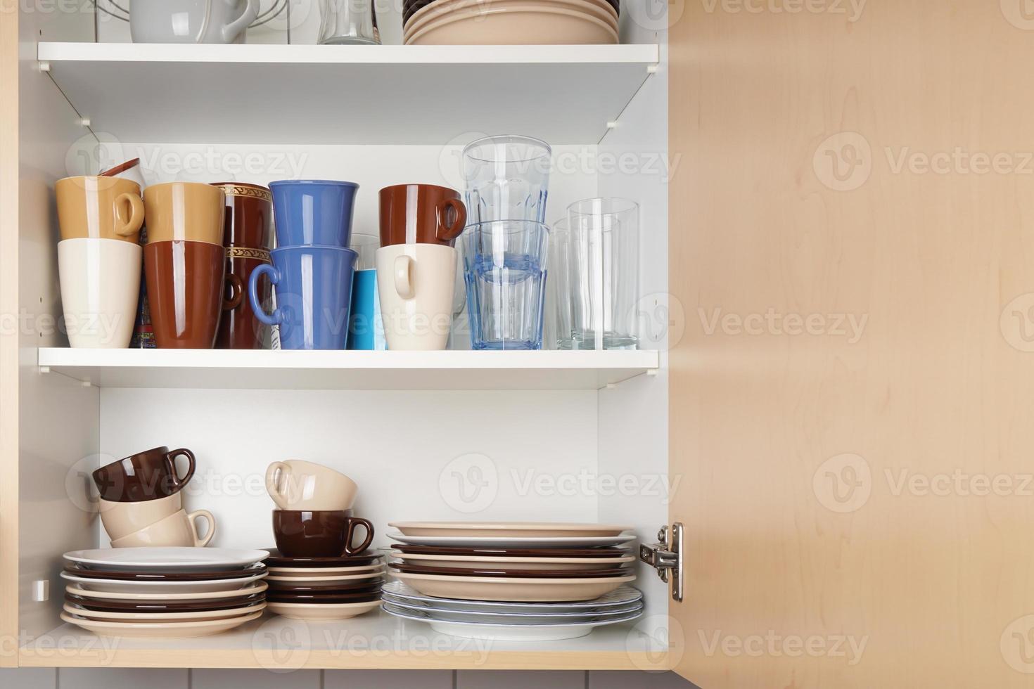 kitchen cabinet or cupboard for dishes photo