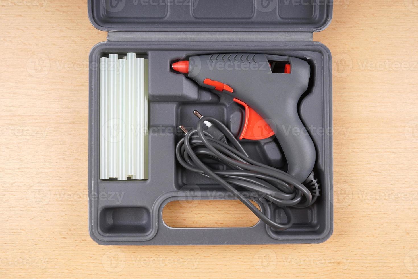 hot glue gun in tool case photo
