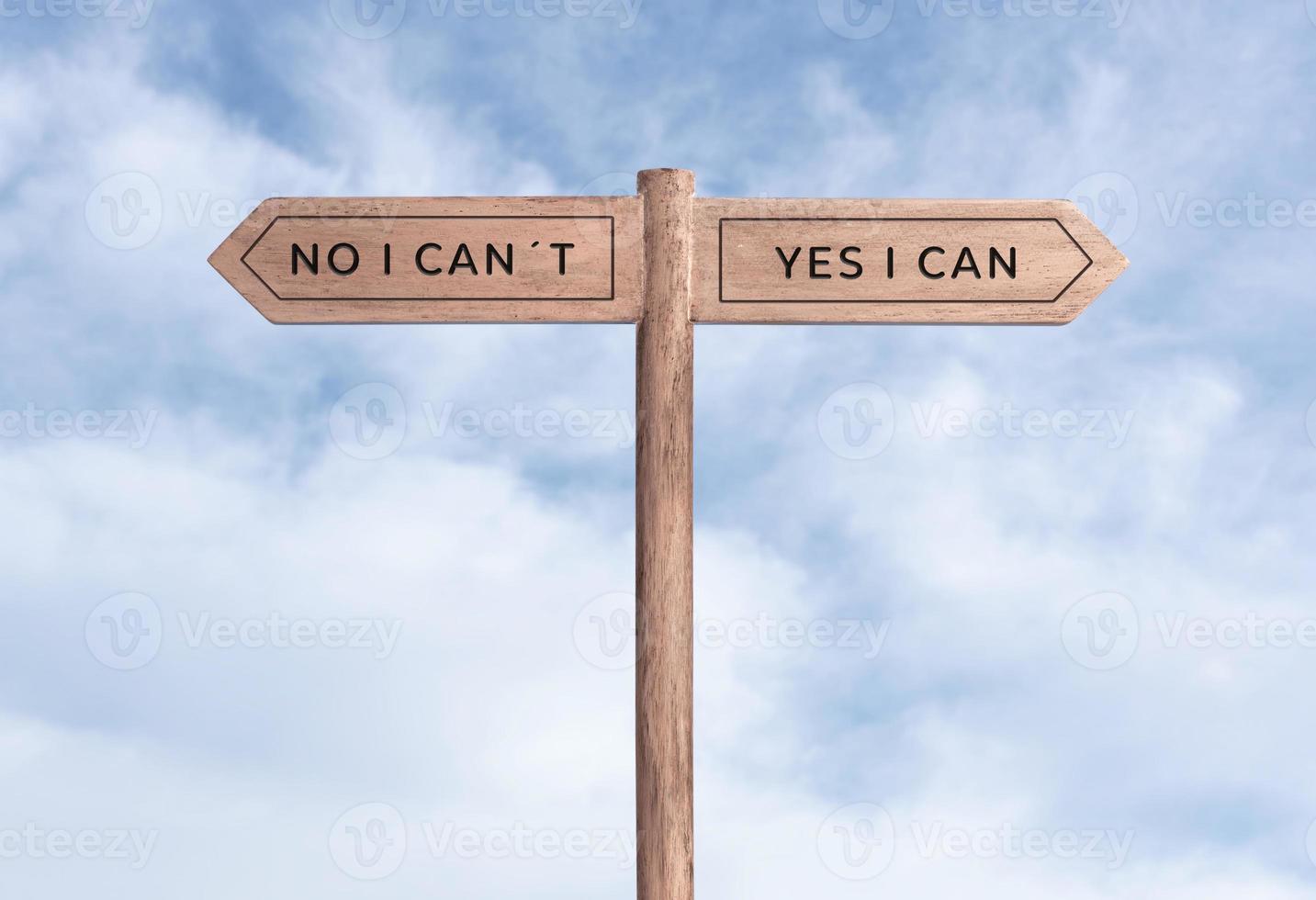 Yes I can concept or No I can not. Signpost with two messages on opposite way and sky background photo