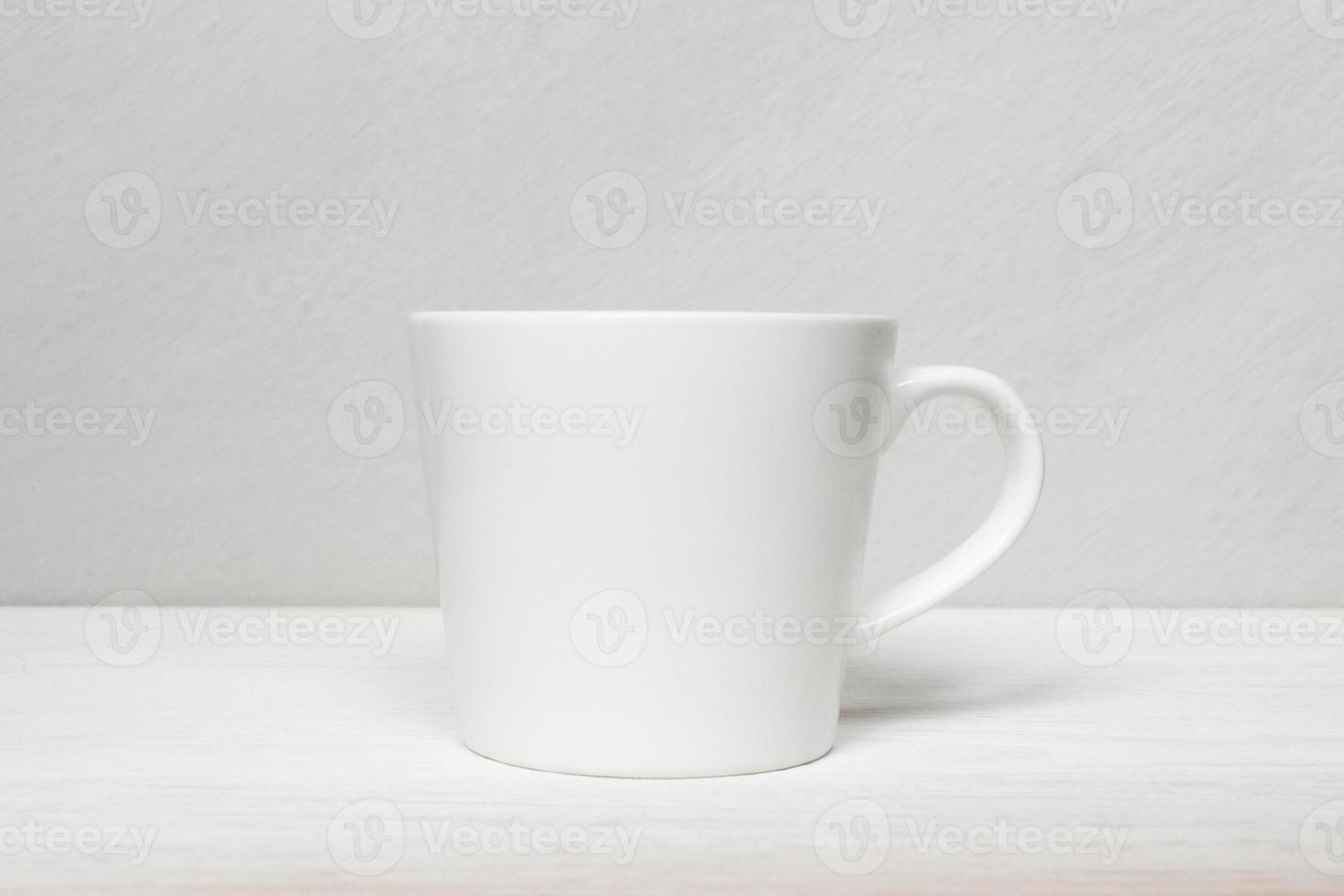 White mockup mug on gray background. photo