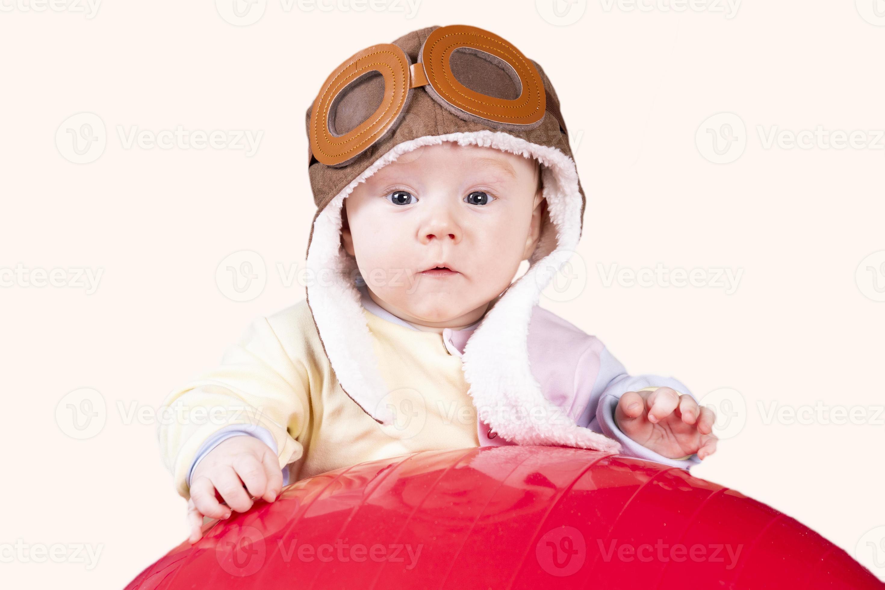 Baby aviator, in pilot hat, close up portrait, isolated on white
