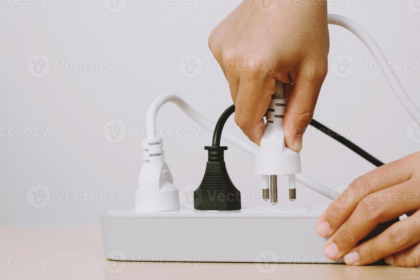 Electrical appliances plugs full of all plugs or plugs together. Because of the risk of causing a short circuit from high heat accumulated in the wires. photo