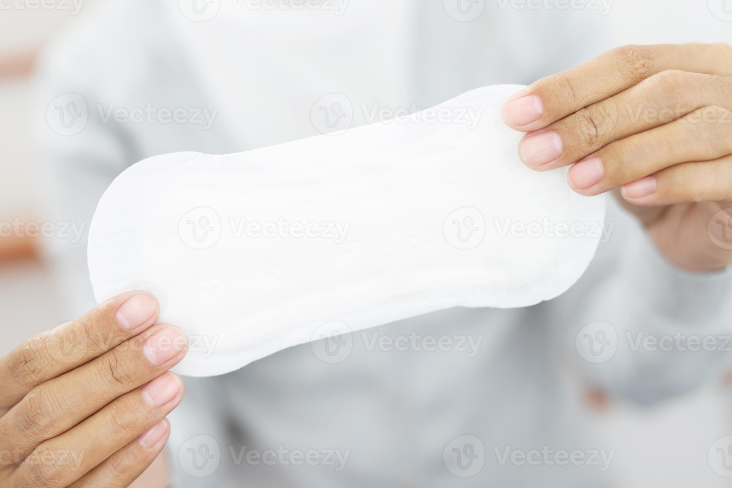 Female Hygiene. Close Up Young woman holding a Clean Period slim