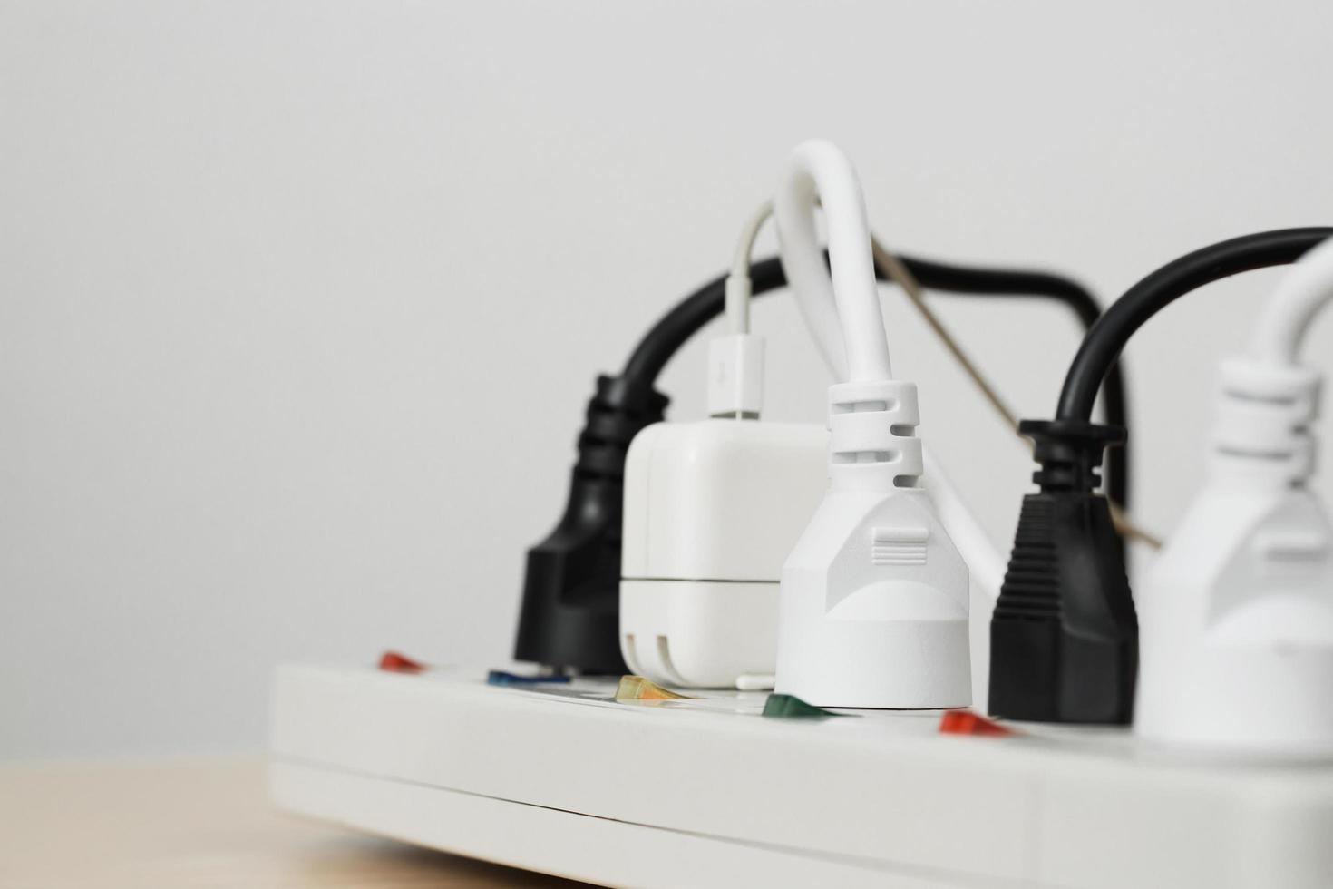 Electrical appliances plugs full of all plugs or plugs together. Because of the risk of causing a short circuit from high heat accumulated in the wires. photo