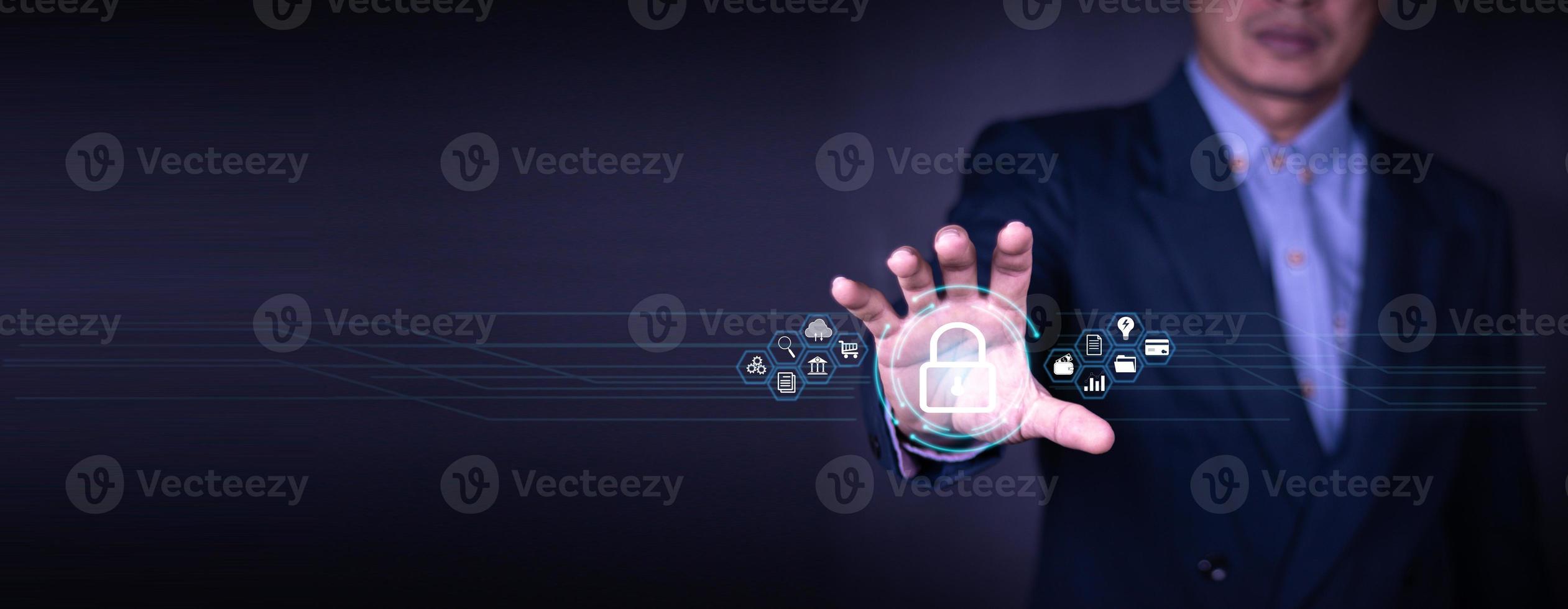 Cybersecurity and privacy concepts to protect data. Lock icon and internet network security technology. Businessman protecting personal data on smart phone with virtual screen interfaces. photo