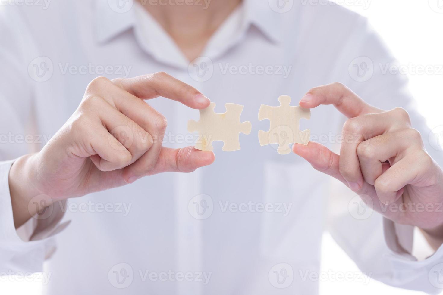 Business Woman solve puzzle as connect to strategy success idea and problem. Work as team match challenge and join company together in game for incomplete fit service, copy space white clean photo