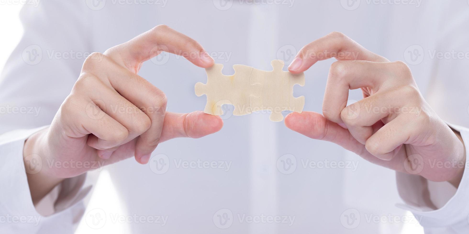 Business Woman solve puzzle as connect to strategy success idea and problem. Work as team match challenge and join company together in game for incomplete fit service, copy space white clean photo