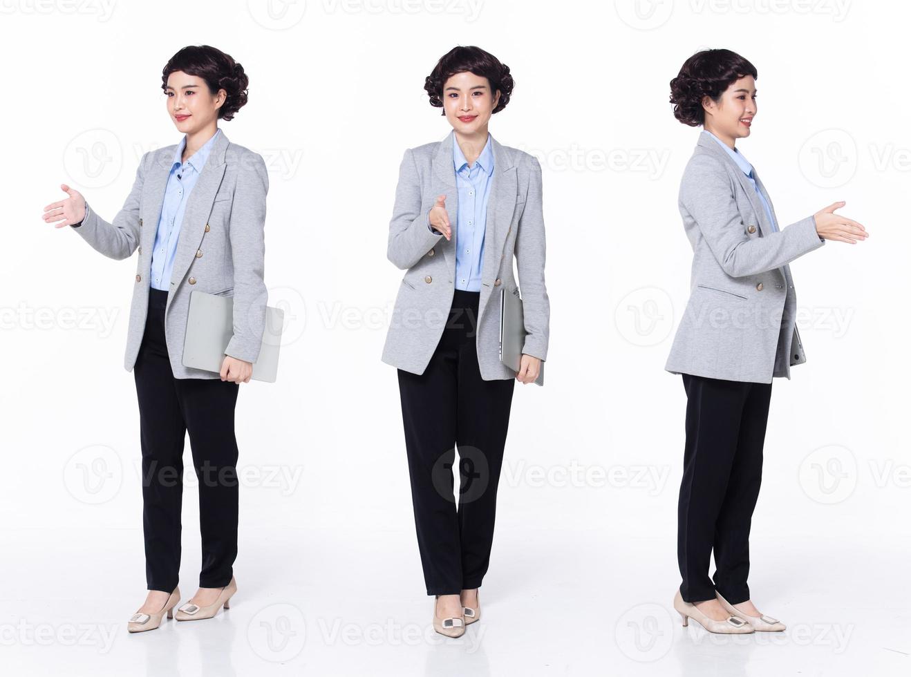 Full length 30s 40s Asian Woman teacher manager business, shaking hand hello, wear formal blazer pants shoes. Smile Office female carry laptop coffee cup over white background isolated photo