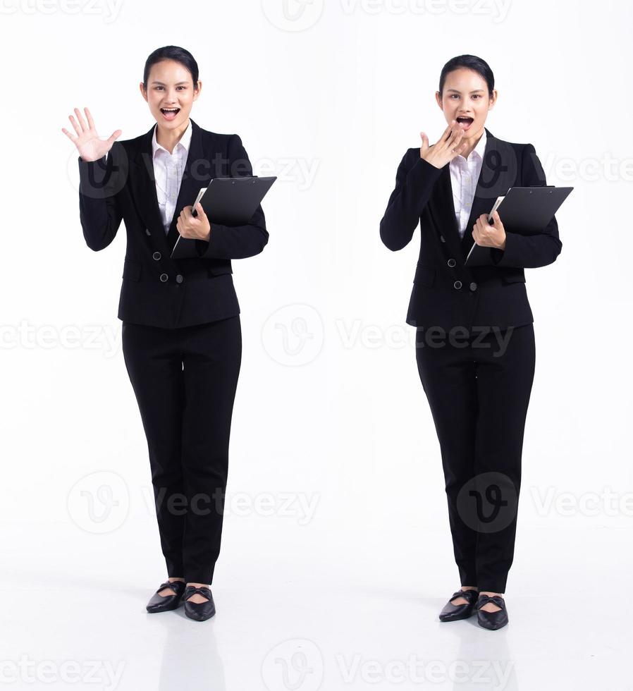 Full length 20s young Mix Race Woman teacher student lawyer, Wow Glad surprise, wear black formal blazer and shoes. Office female stands feels happy smile over white background isolated photo