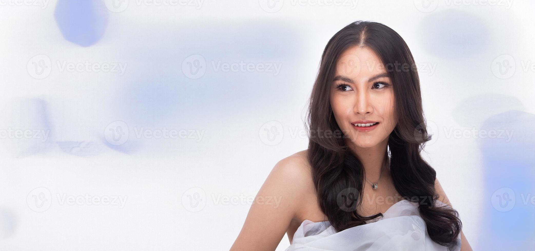 Half body Face of Asian Arab Indian tanned skin woman shows beautiful smile happy eyes lips photo