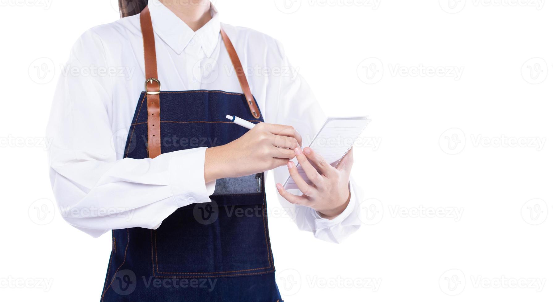 Waitress hold menu note order to service customer client in shop restaurant with smile. Employee staff wear apron to serve as entrepreneur owner for small business, copy space white background photo