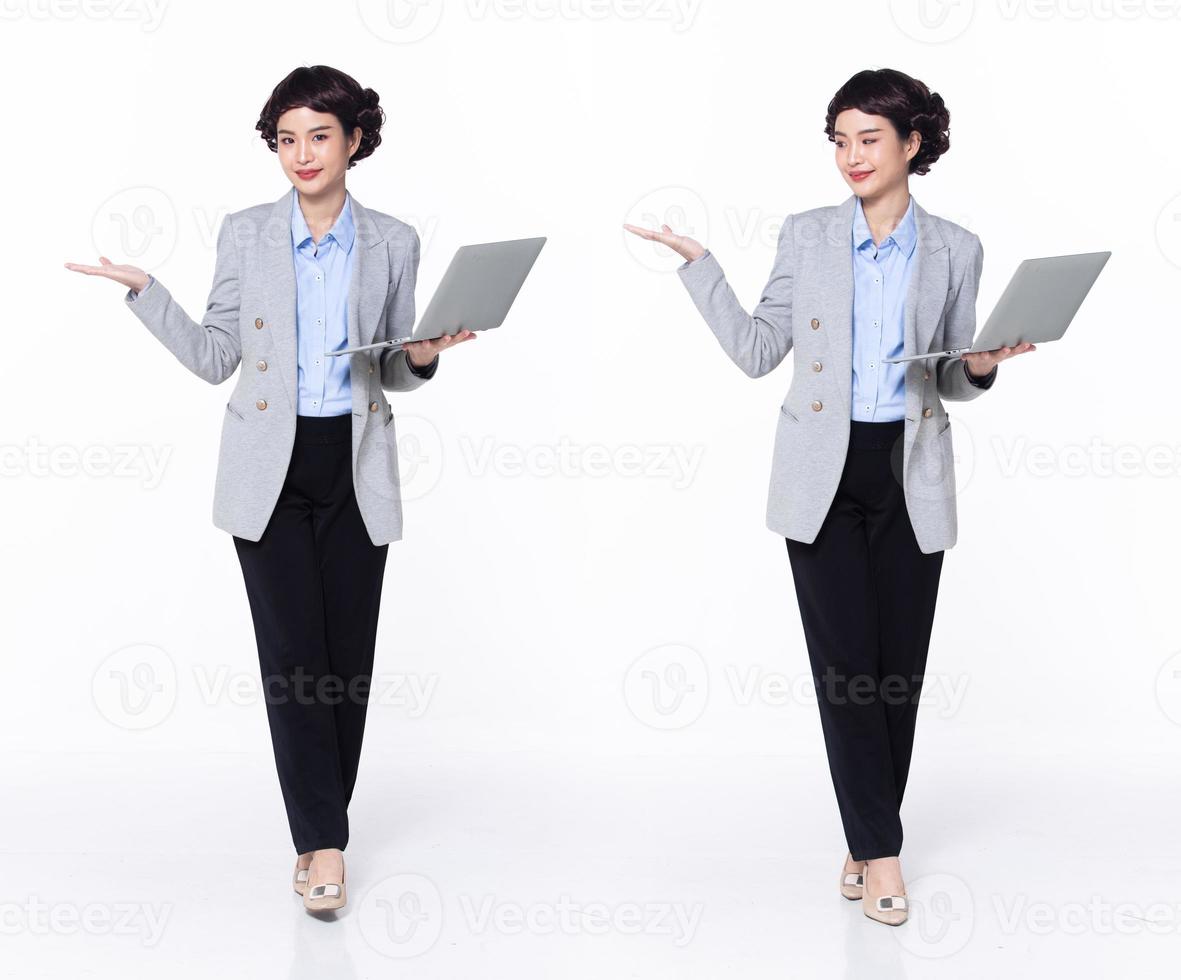 Full length 30s 40s Asian Woman teacher manager business, showing empty palm hand photo