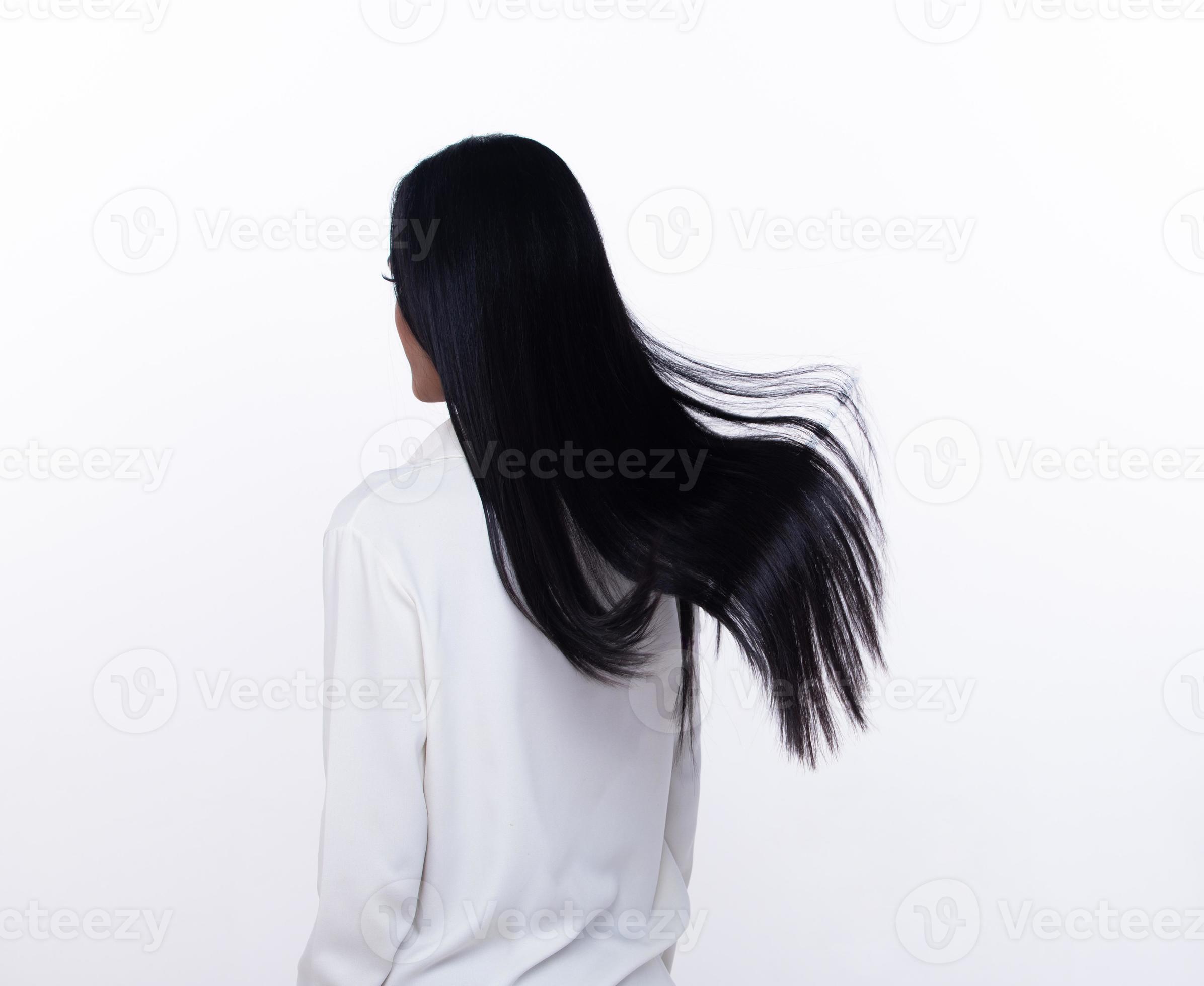 Black Straight Long Black Hair woman throw fly in air with fashion stylish and fun joy. Female turn back wear white shirt express emotion happy by blow wind hair, isolated white background Black Straight Long Black Hair woman throw fly in air with fashion stylish and fun joy. Female turn back wear white shirt express emotion happy by blow wind hair, isolated white background