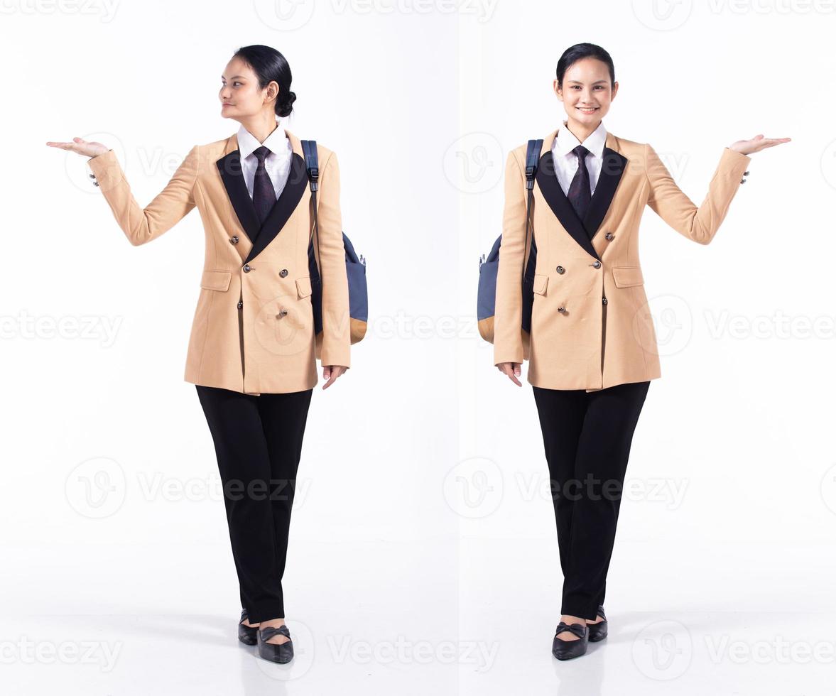 Full length 20s young Mix Race Woman business salesman backpacks, wow surprise palm hand, wear formal blazer and shoes. Office female stands feels happy smile over white background isolated photo