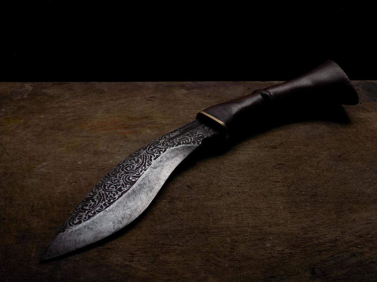 a knife with an iron engraving photo