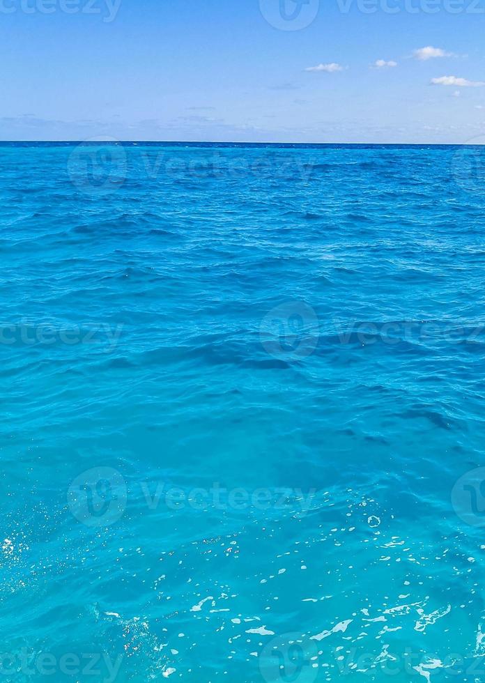 Blue turquoise water waves ocean and sea texture pattern Mexico. photo