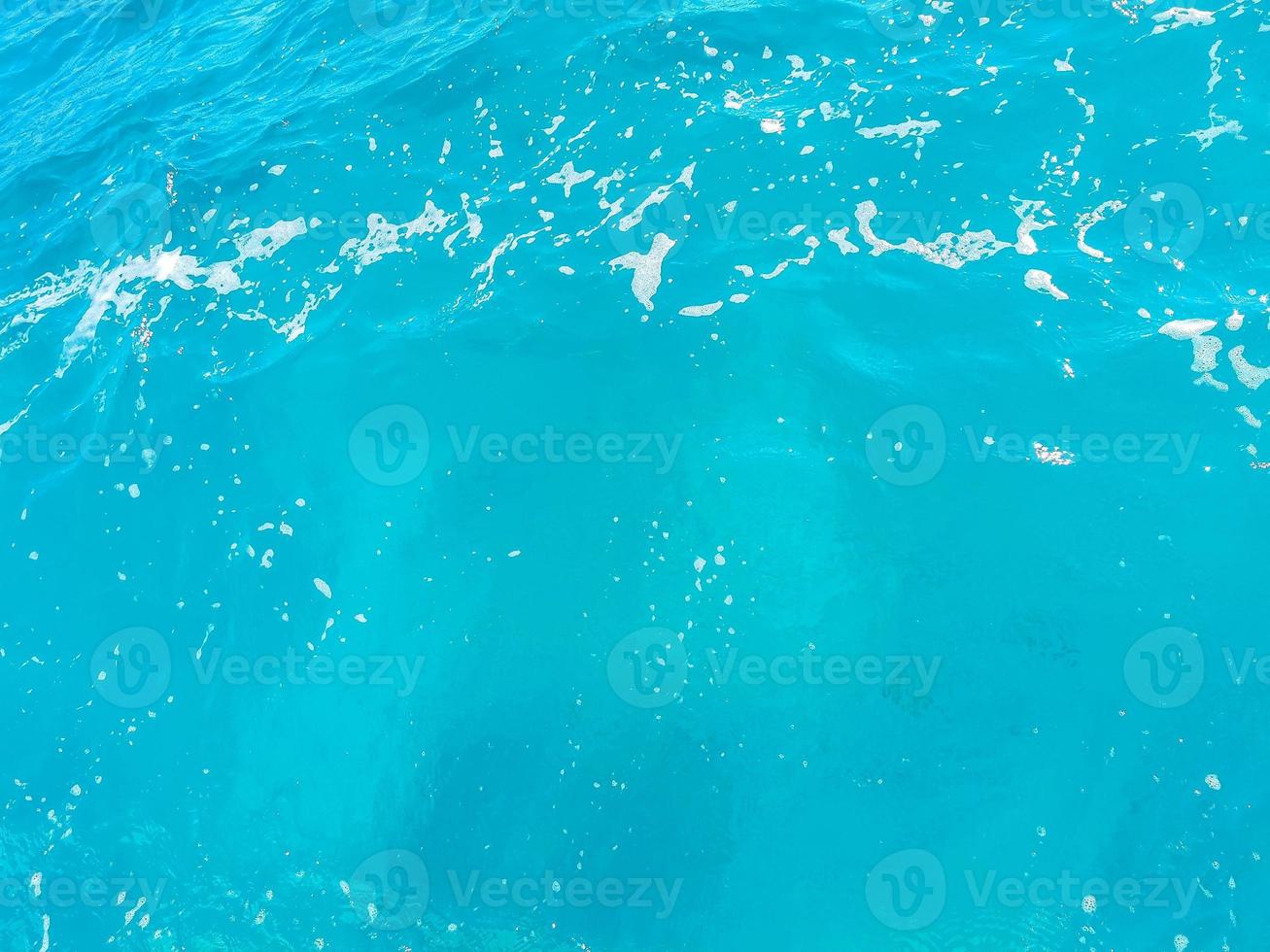 Blue turquoise water waves ocean and sea texture pattern Mexico. photo