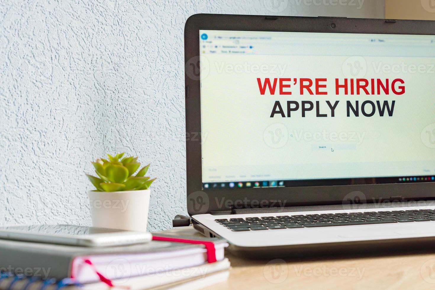 Online job seach. Home office. Notebook with open job searching page photo