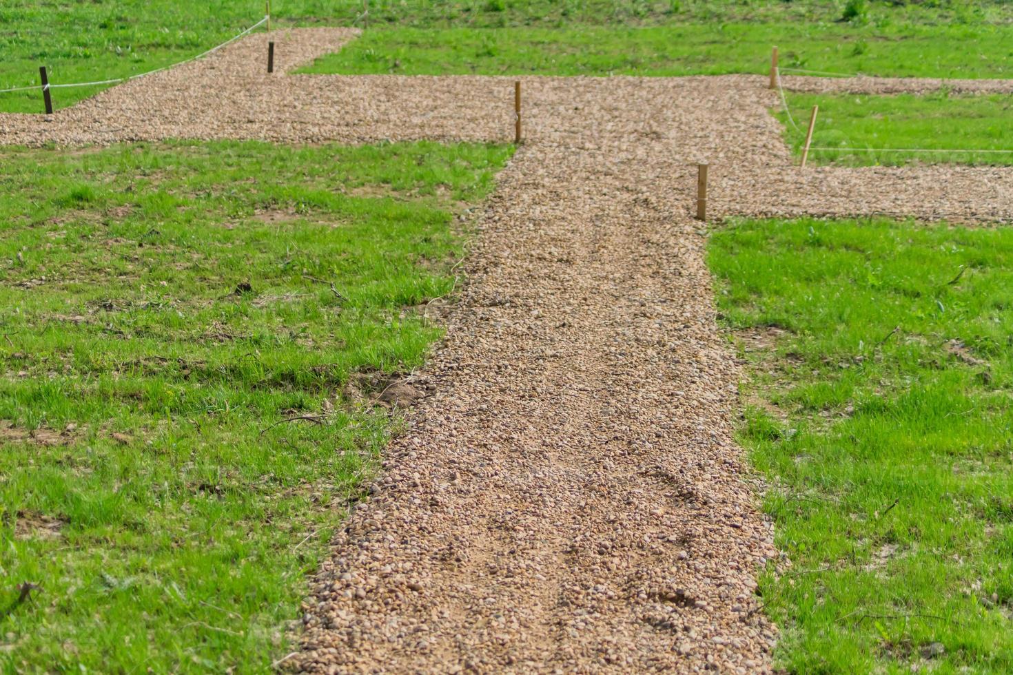 marking garden paths on the construction site. Countryside house building photo