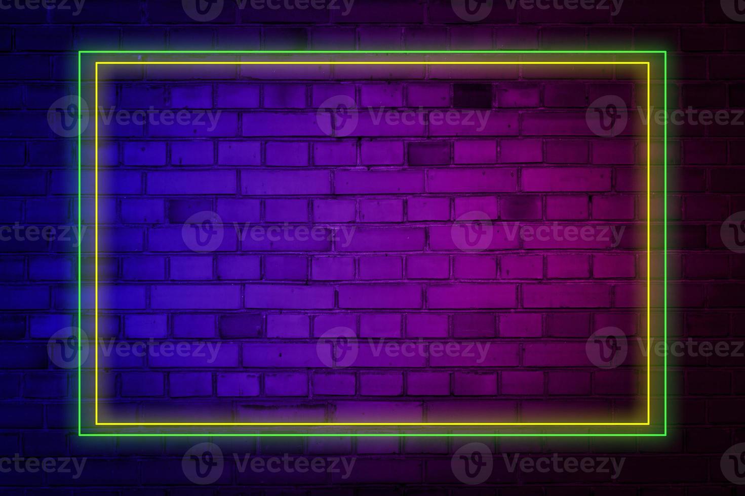 Lighting Effect frame green and yellow background neon on brick wall for background party or your text. photo