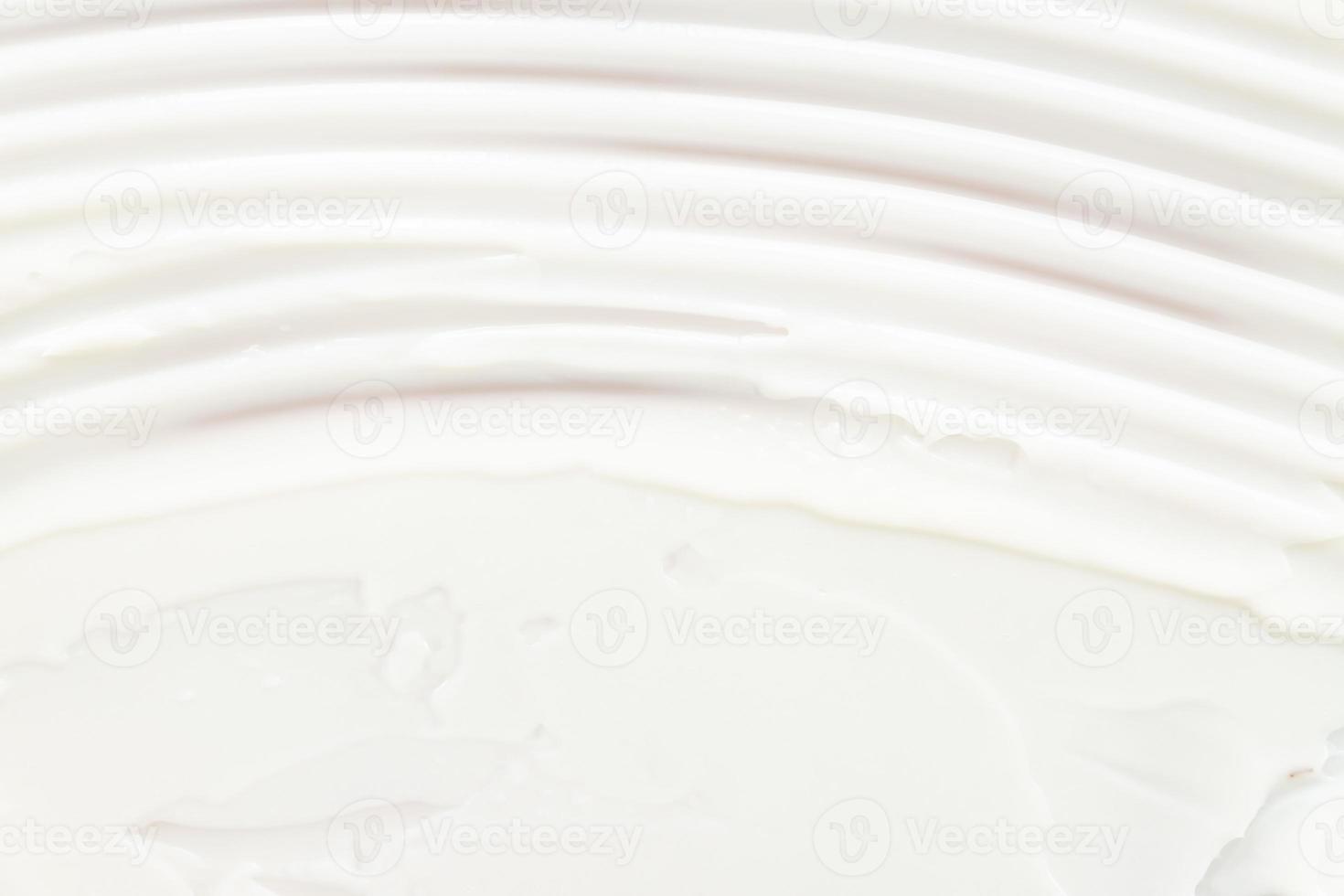 White cream or body lotion texture background with copy space. Cosmetic texture background. Cream smear. Selective focus photo