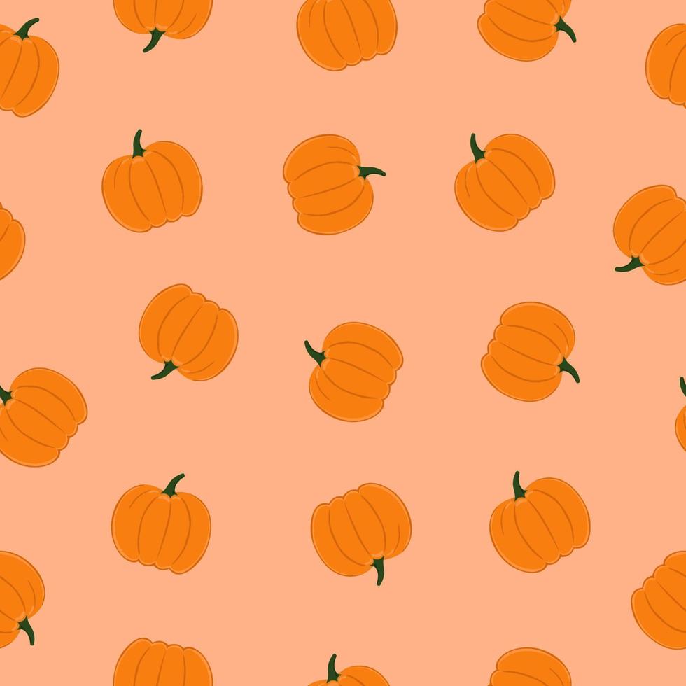 Seamless pattern of pumpkins on pink background. Background for autumn