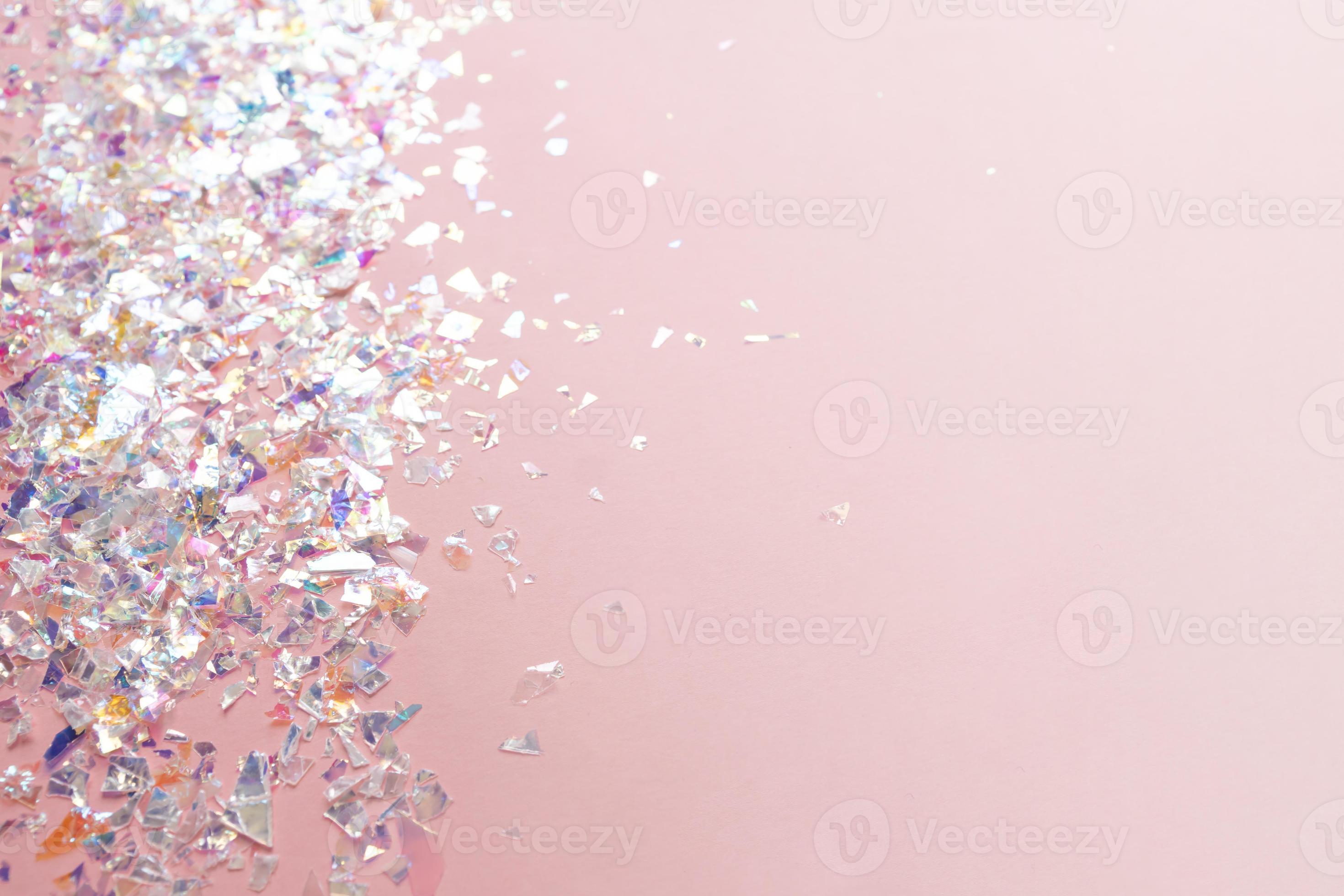 neon pearl foil confetti on light pink background. Festive, party or