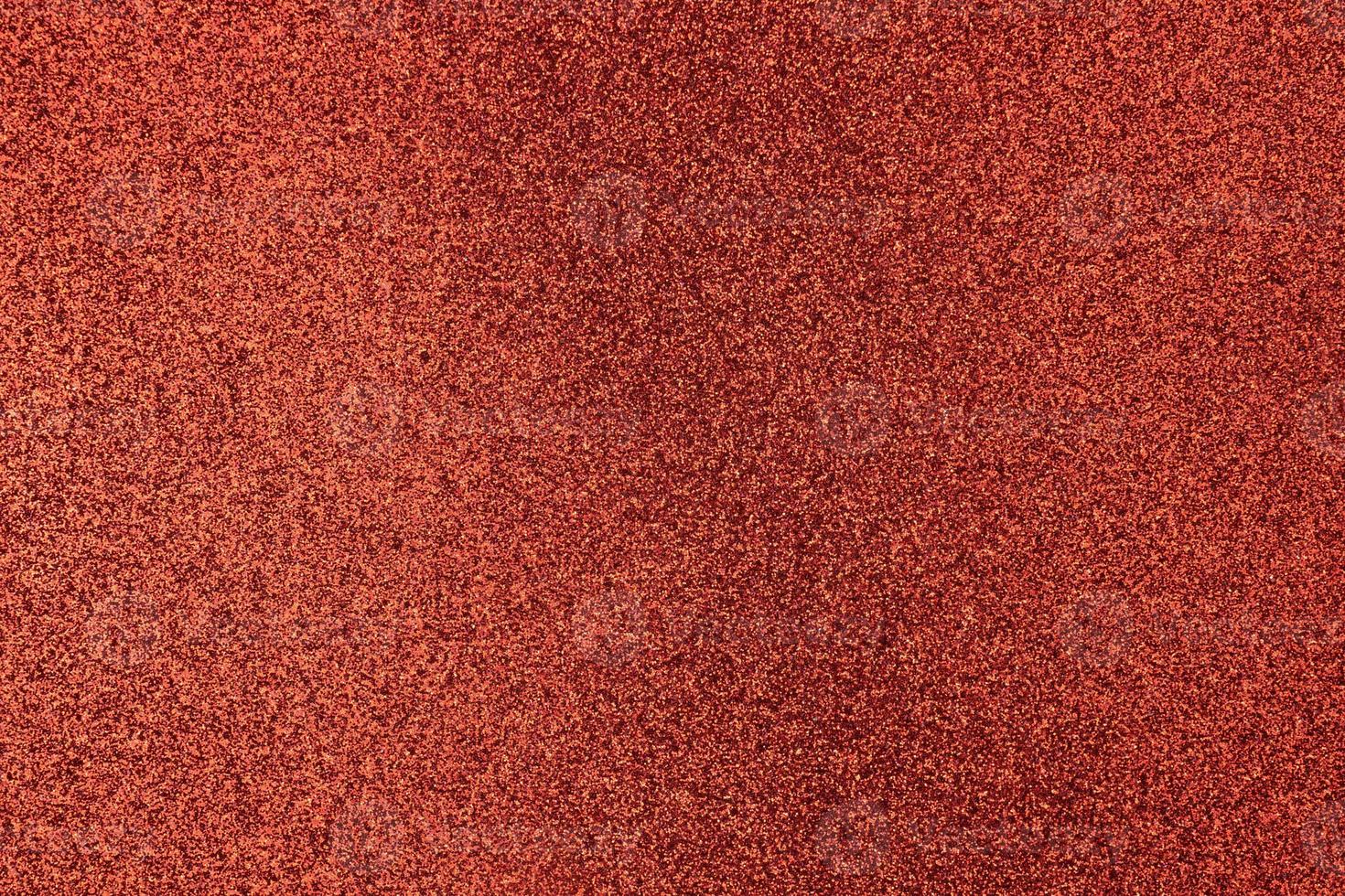 brilliant sparkling red background for a festive decoration photo