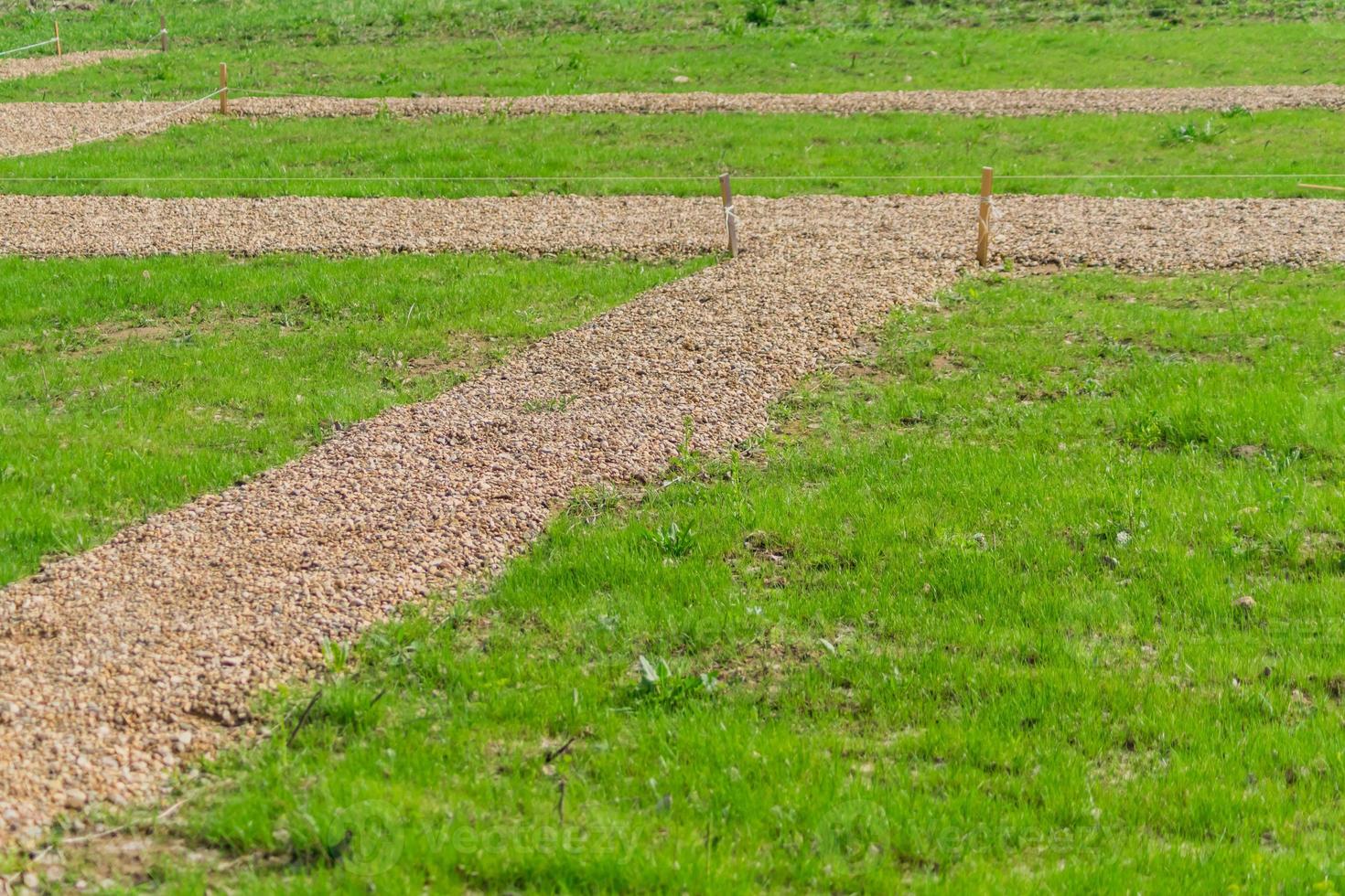 marking garden paths on the construction site. Countryside house building photo