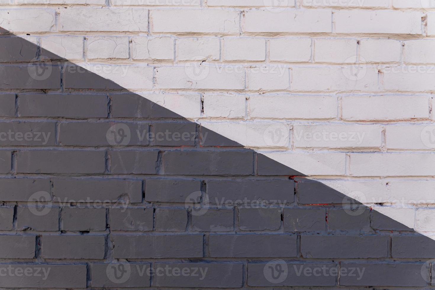 Grey painted brick wall background, textured backdrop. copy space for designers photo