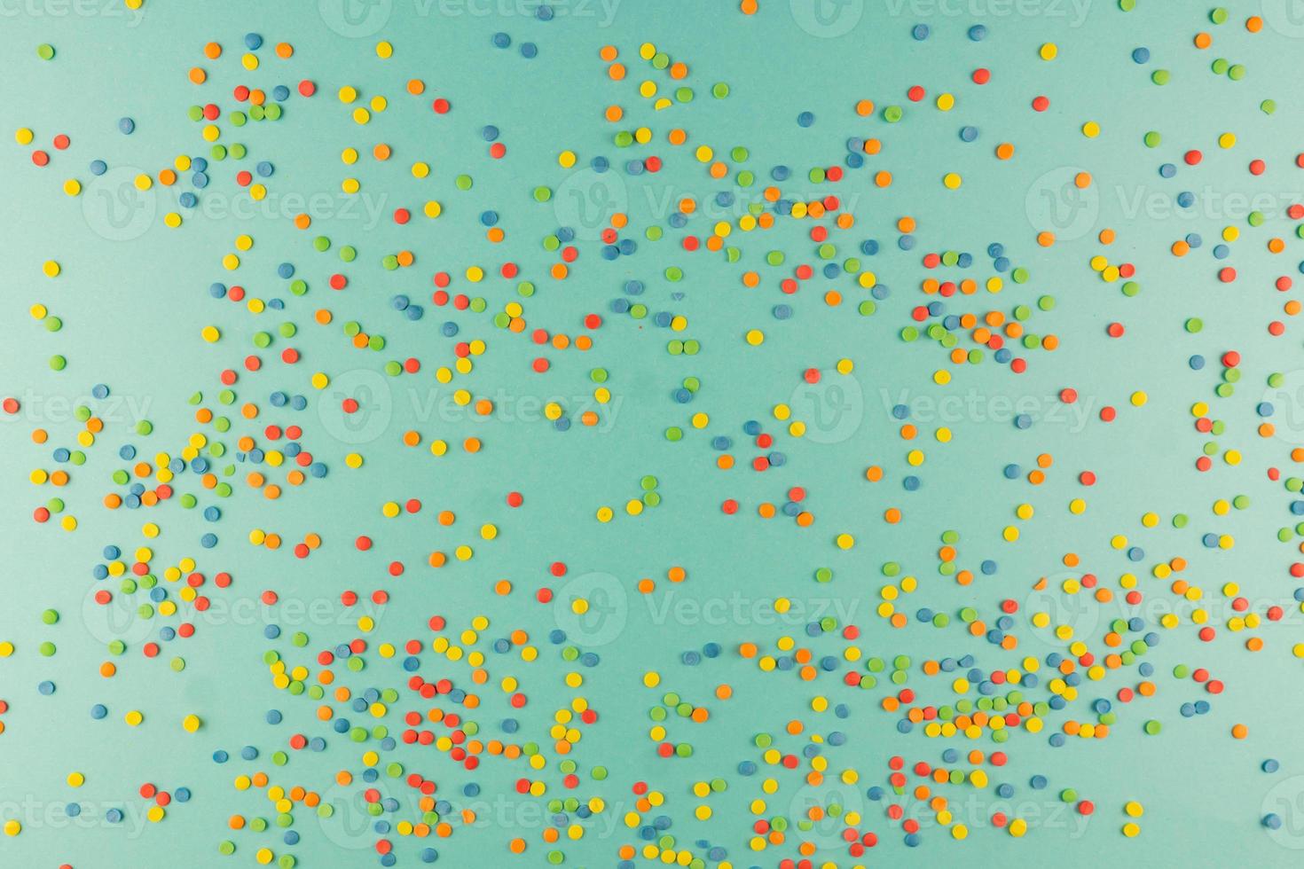 sprinkles background, sugar sprinkle confetti, decoration for cake and bakery. Top view, flat lay. pastel colors photo