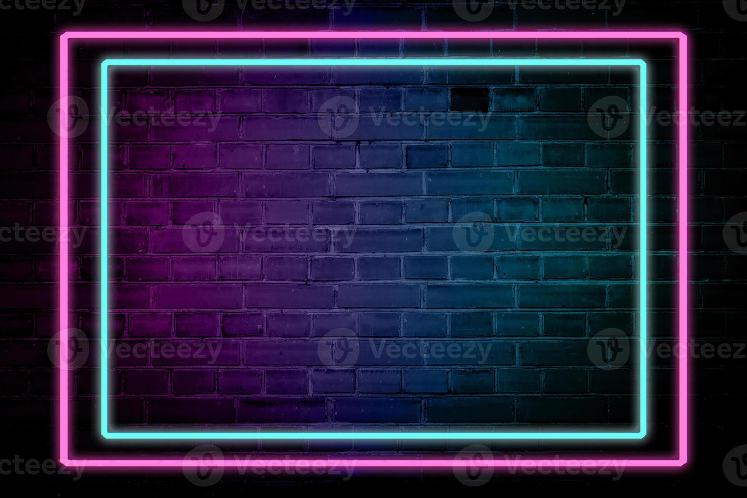 Lighting Effect frame pink and blue neon on brick wall for background party or your text. photo