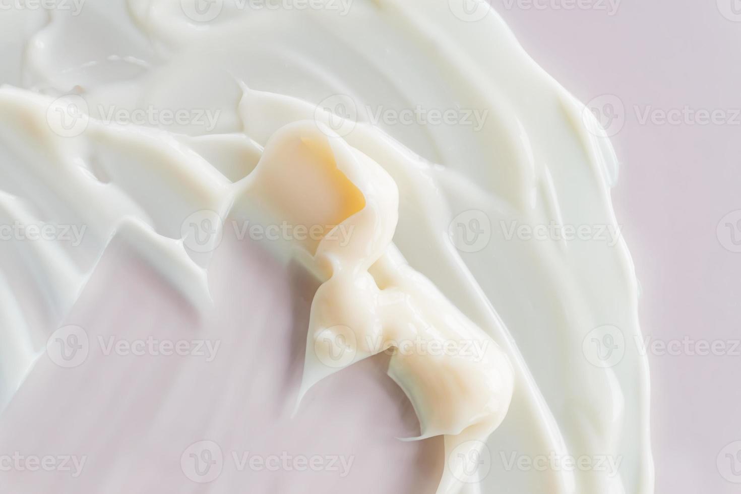 Cosmetic lotion background. Light cream smeared. Moisturizer, mask, creamy skin care product texture photo