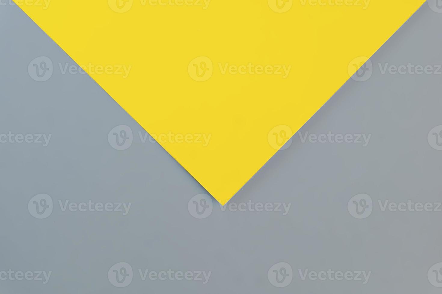 Flat lay in a trendy 2021 new colors. Illuminating Yellow and Ultimate Gray. Color of the Year 2021. photo