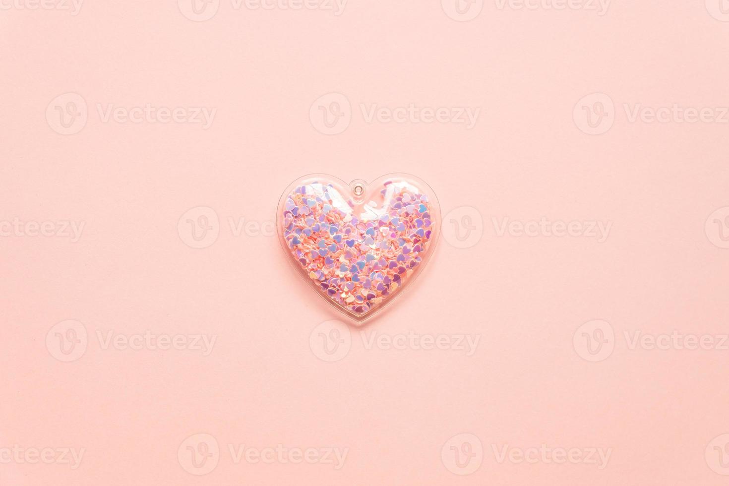 Valentine's day concept with pink heart on light background, top view, copy space. photo