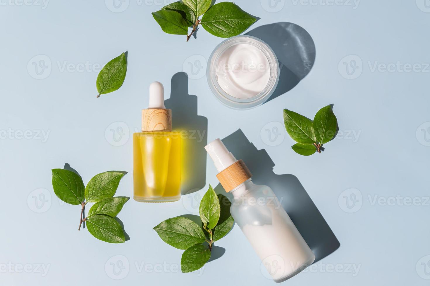 Skin care cosmetics set. Unbranded logo mockup bottles. Daily routine and complete nourishing for dry skin. Anti aging cosmetics with collagen, peptides and natural ingredients. photo