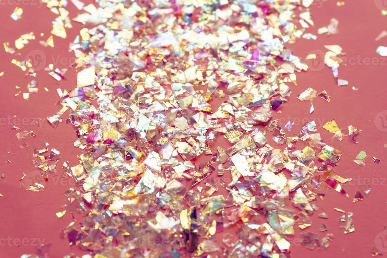 Neon pearl confetti and sparkles background. Top view, flat lay. Copyspace for text. Bright and festive holiday background. For Christmas, New year, Mother's day. photo