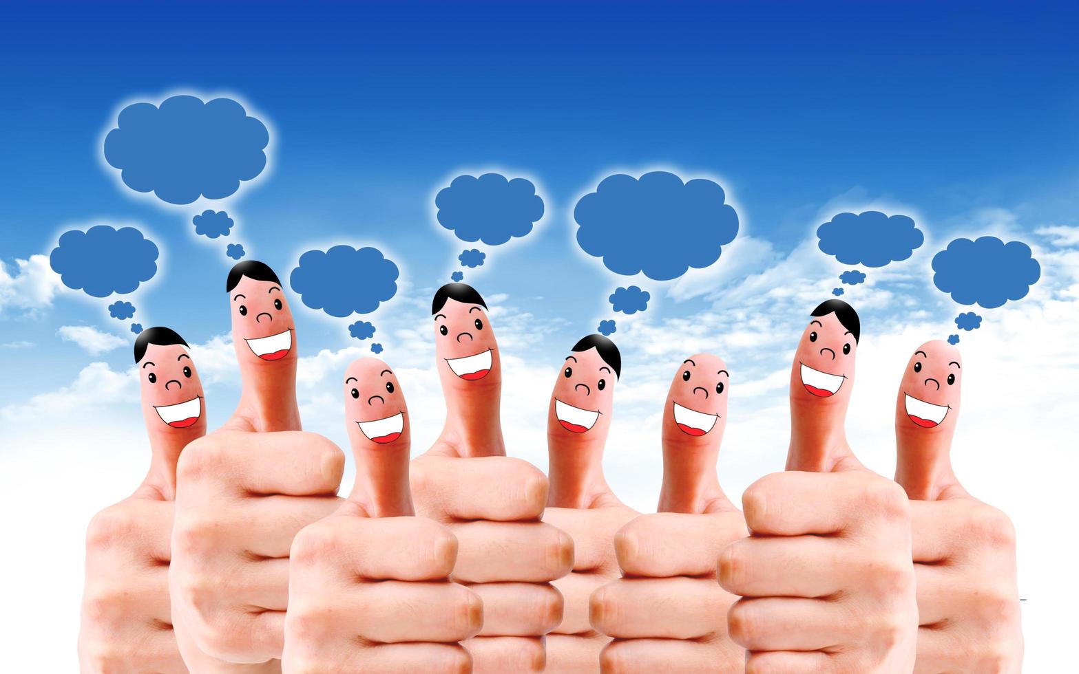 group of finger faces with social chat sign and speech bubbles photo