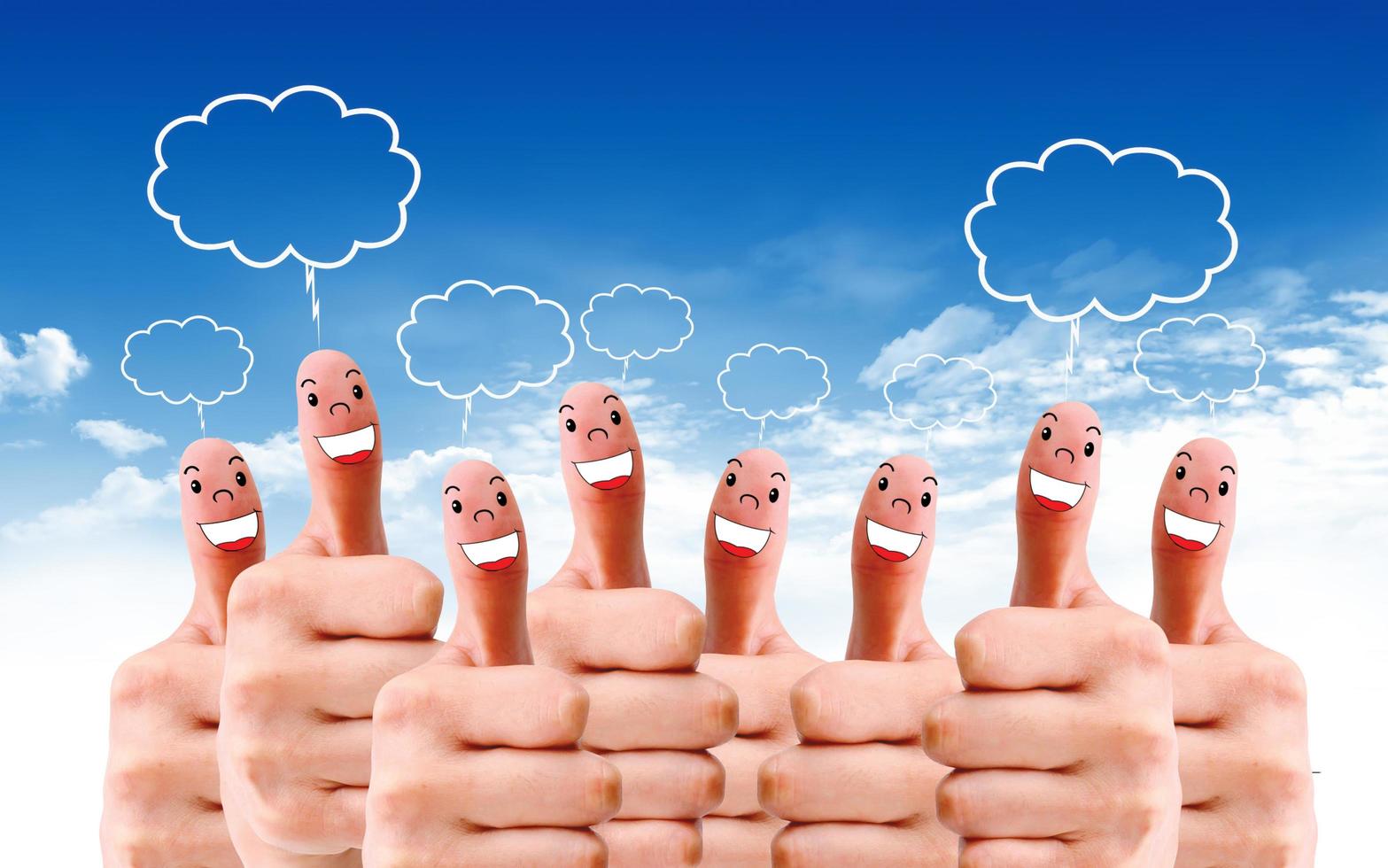 group of finger faces with social chat sign and speech bubbles photo